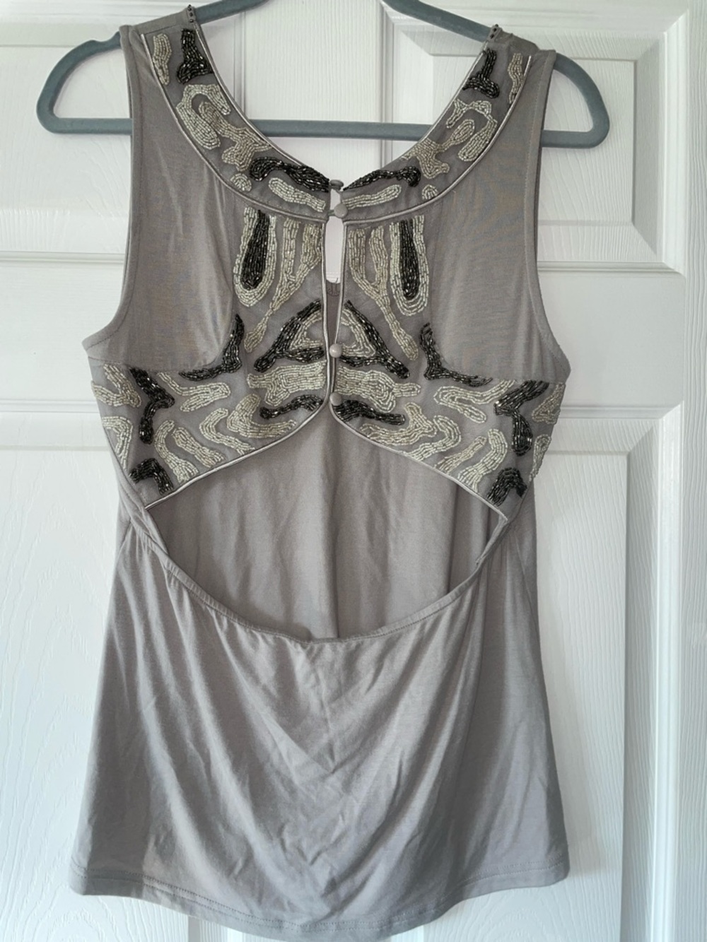 BKE Boutique beaded open back top